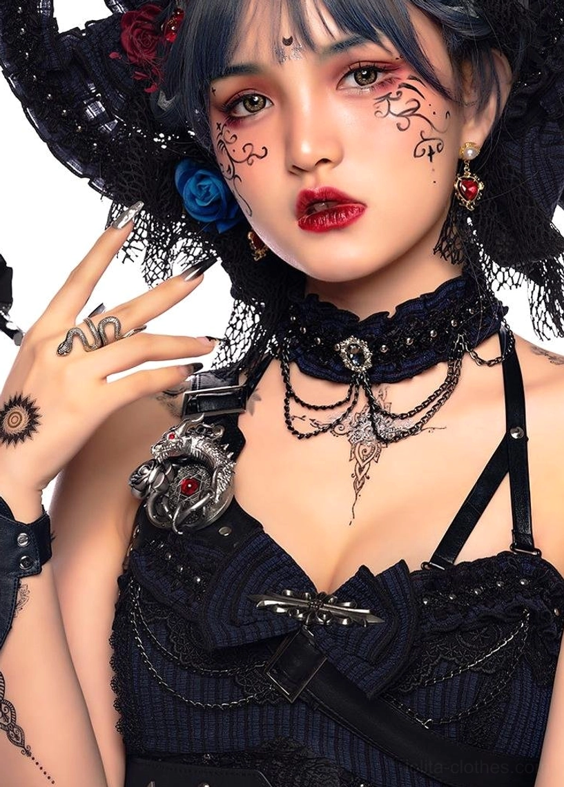 Gothic Lolita complete coordinate styling example showing JSK dress with waist cincher, back bow trailing, BNT top, tulle cloak, full ensemble worn together