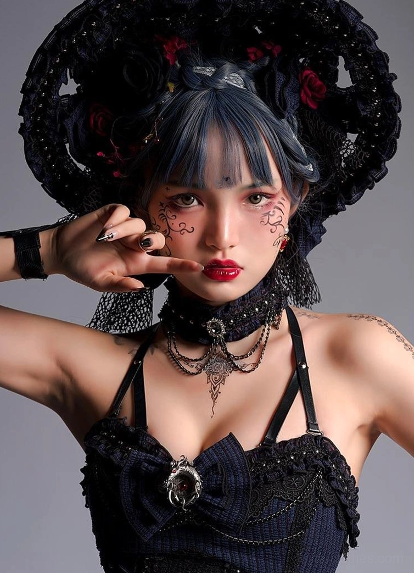 Gothic Lolita JSK back bow attachment detail showing decorative oversized bow, removable chest bow option, structural design elements