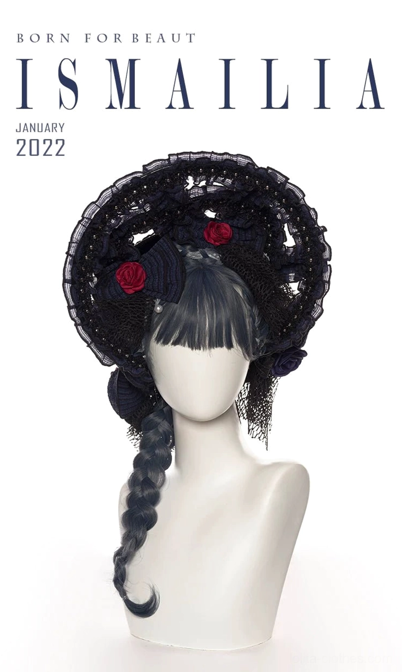 Gothic Lolita JSK dress romantic gothic coordinate example showing layered styling with tulle cloak, delicate jewelry, fairy-tale dark aesthetic
