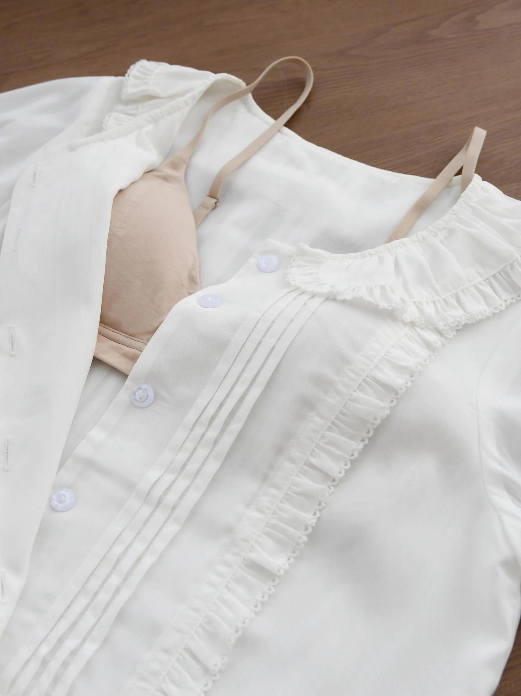 Ivory sweet Lolita blouse double-layered chiffon back view showing delicate construction, ruffled collar back, button placket, and hem flounce details
