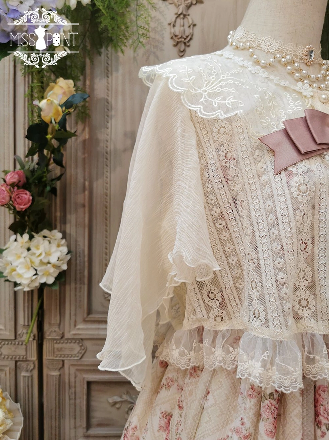 ivory lolita blouse with lace collar trim and pearl button embellishments coordinate styling