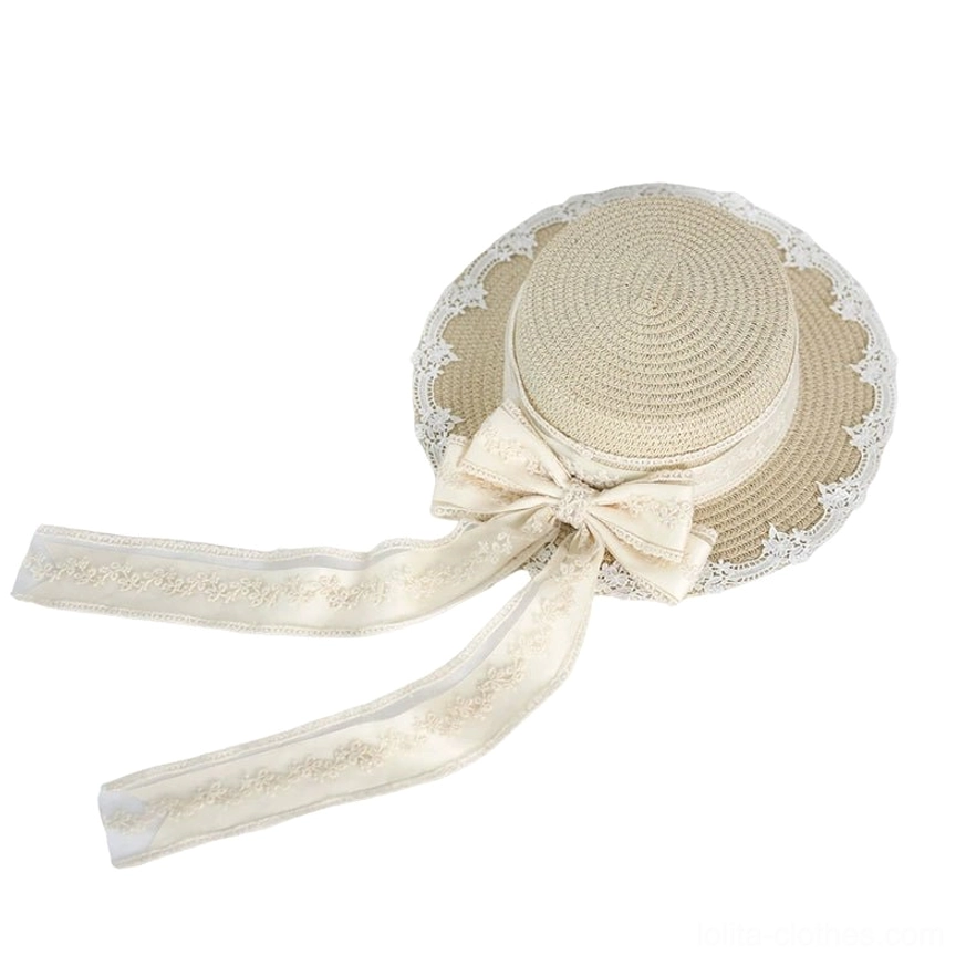 Single ivory lolita lace straw hat side flat oblique view displaying scalloped lace brim edge, front embroidered bow with flowing lace ribbons, natural beige straw color detail
