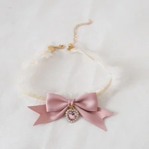 Sweet lolita bridal headdress collection featuring ivory ruffled lace, dusty pink satin bows, and crystal rhinestone embellishments displayed on white background with seven interchangeable accessory pieces