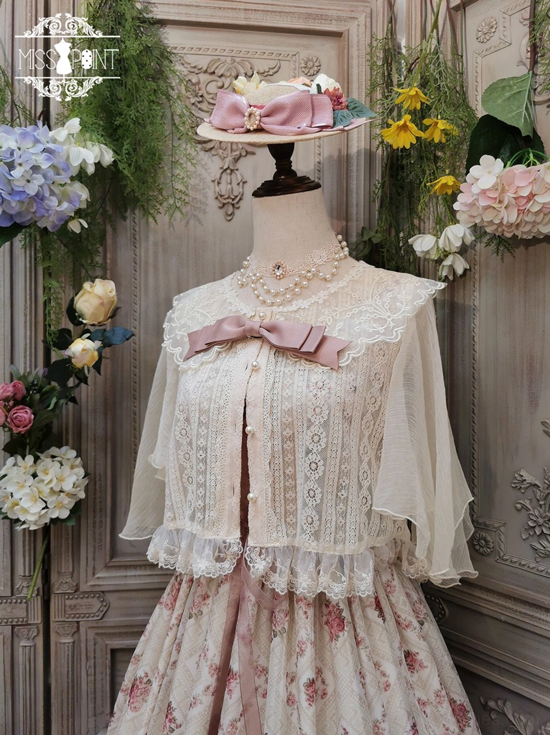 ivory short sleeve retro lolita blouse with embroidered collar and pearl button closure