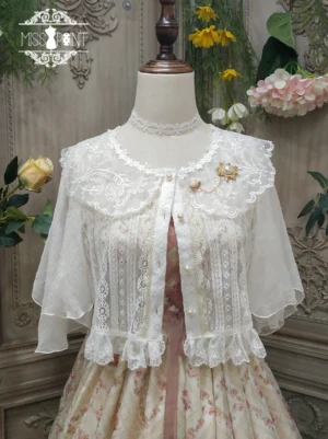 ivory short sleeve retro lolita blouse with lace lapel and pearl buttons front view on dress form