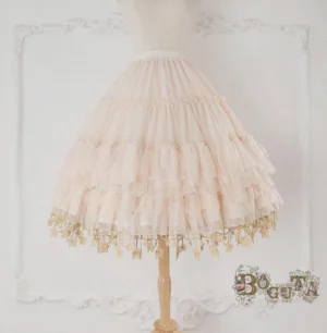 Ivory cream tulle A-line Lolita petticoat with gold star tassel hem decoration on dress form front view