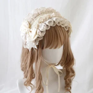 Ivory elegant Victorian lace Lolita headband with ruffled embroidered lace and satin bow decoration displayed on curly blonde wig mannequin front three-quarter view