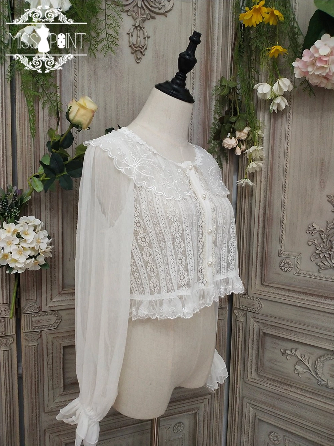 ivory vintage lolita blouse with lace trim and flounce hemline Victorian silhouette