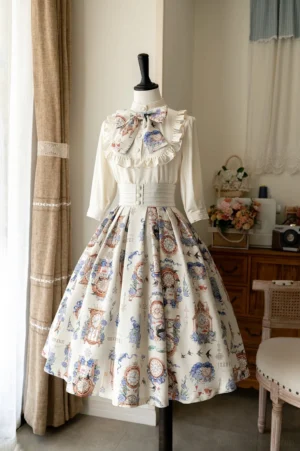 Ivory white printed lolita skirt with vintage clock rabbit floral swallow design paired with matching beige blouse indoor home setting with wooden furniture