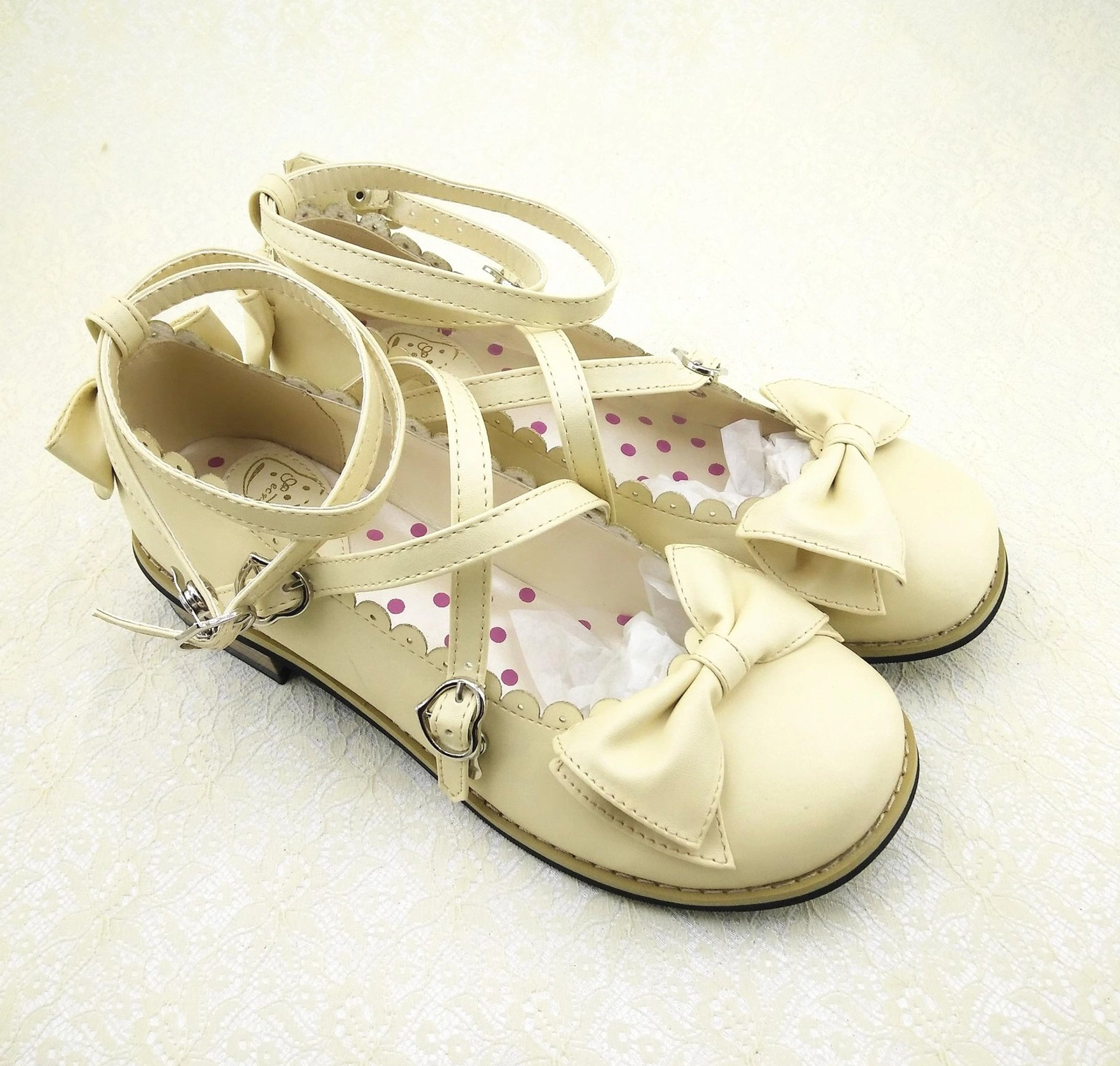 Japanese Lolita fashion low heel princess shoes with authentic sweet Lolita aesthetic, cross buckled ankle straps, polka dot inner details, suitable for tea party and costume wear