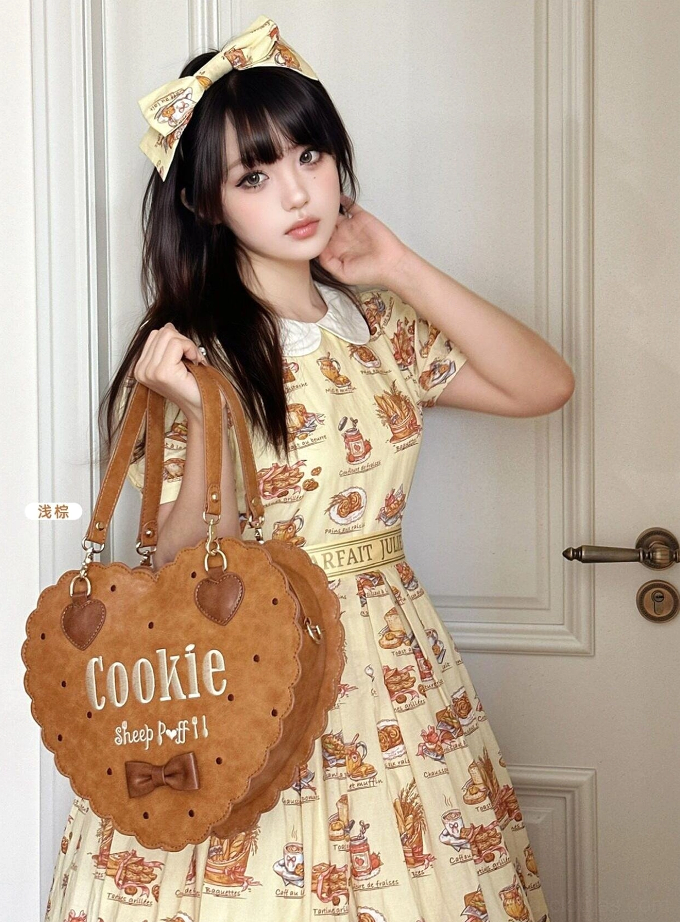 Kawaii cookie-themed lolita handbag in light brown showing front embroidery and decorative bow details