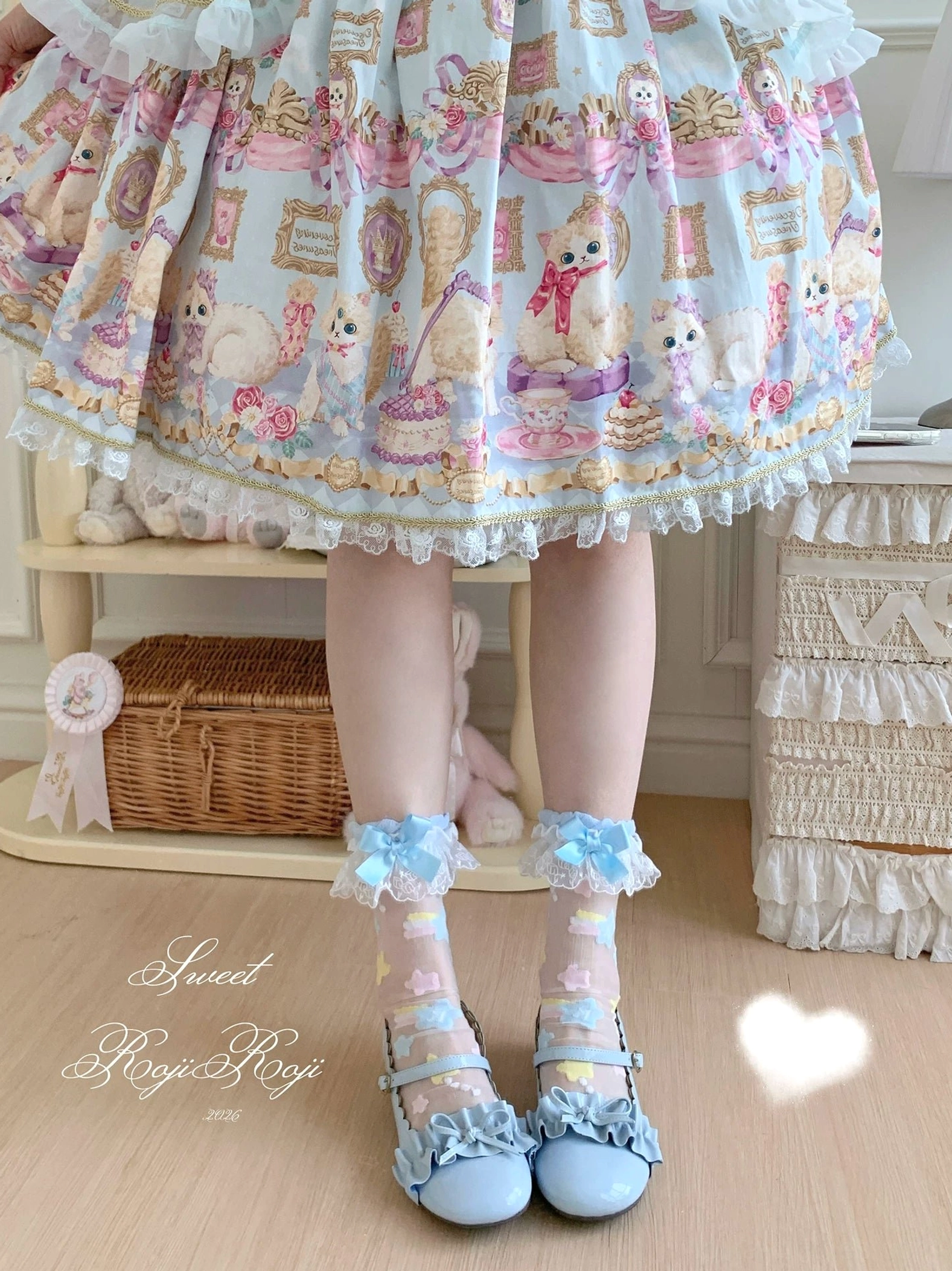 Kawaii fairy-tale themed lolita socks with multicolor star embroidery and matching satin bow accents