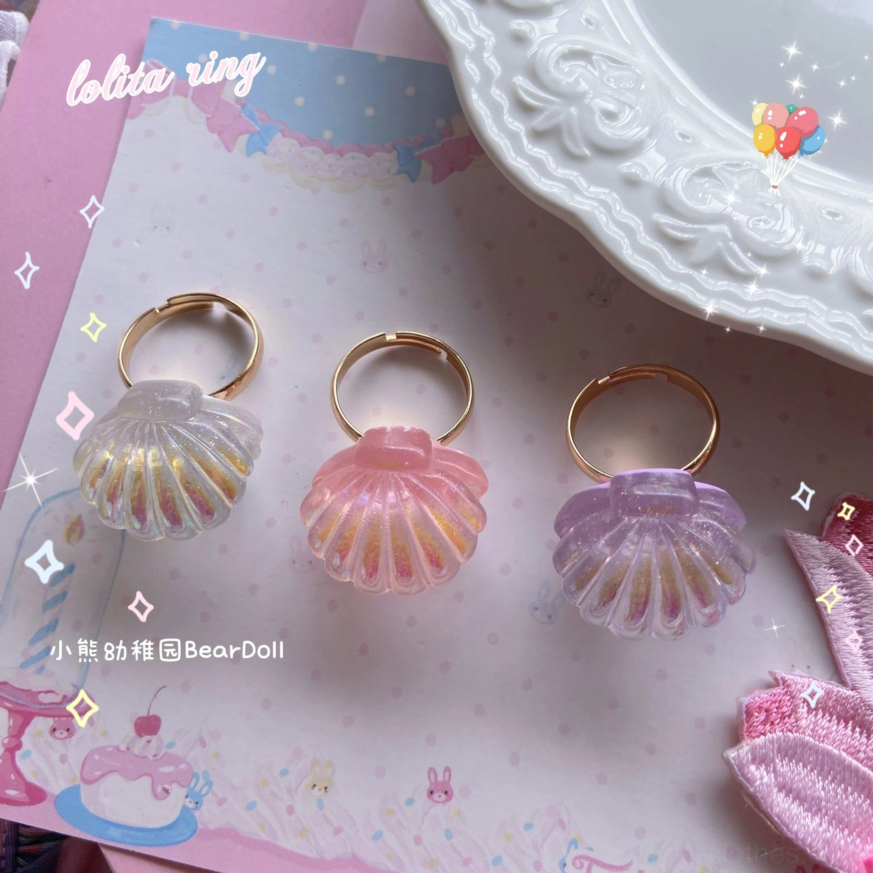 Kawaii Lolita resin adjustable ring collection showcasing pastel heart and seashell charm designs