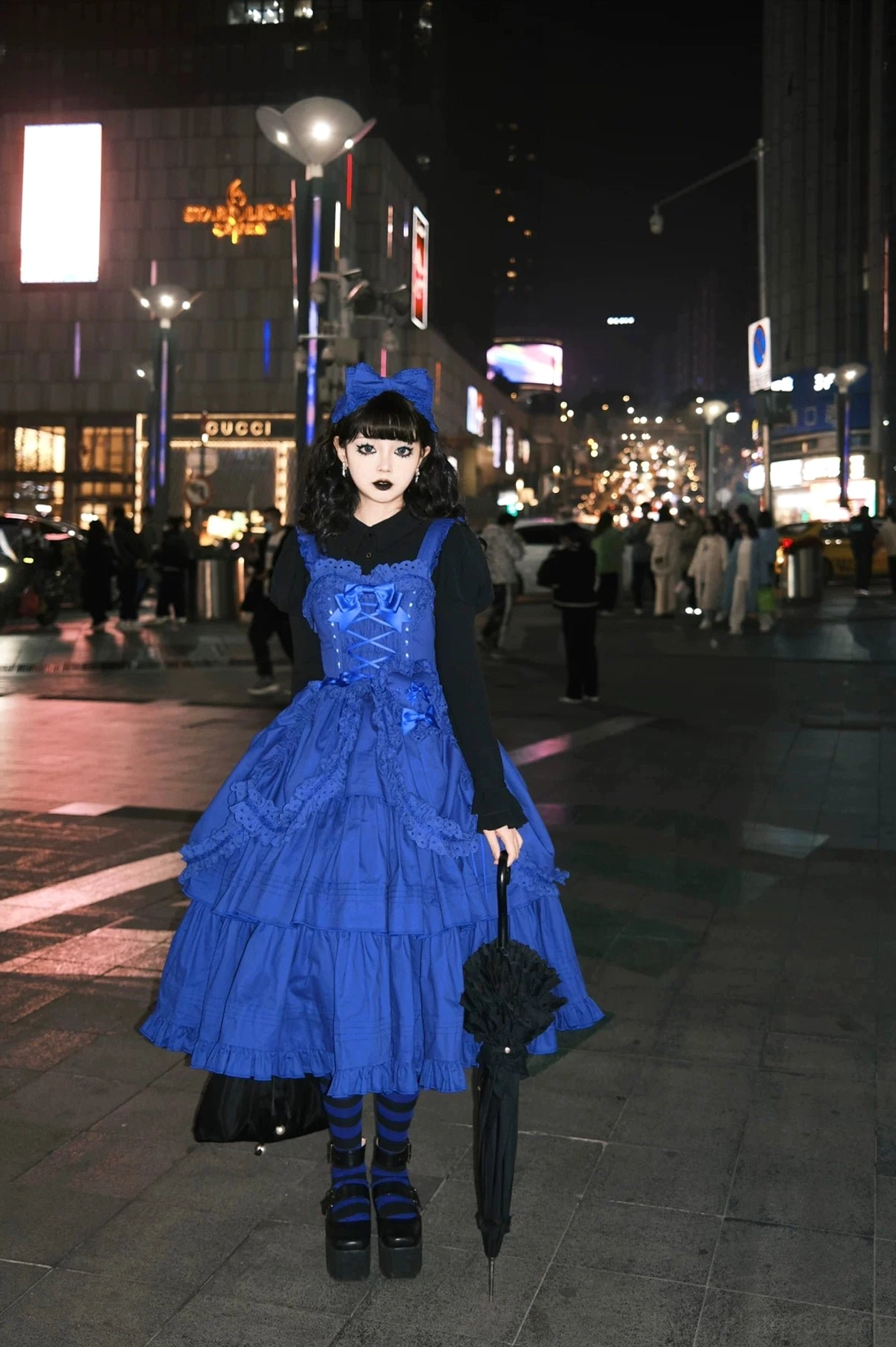 Lolita fashion community styling photograph featuring klein blue Gothic JSK in coordinate outfit with accessories