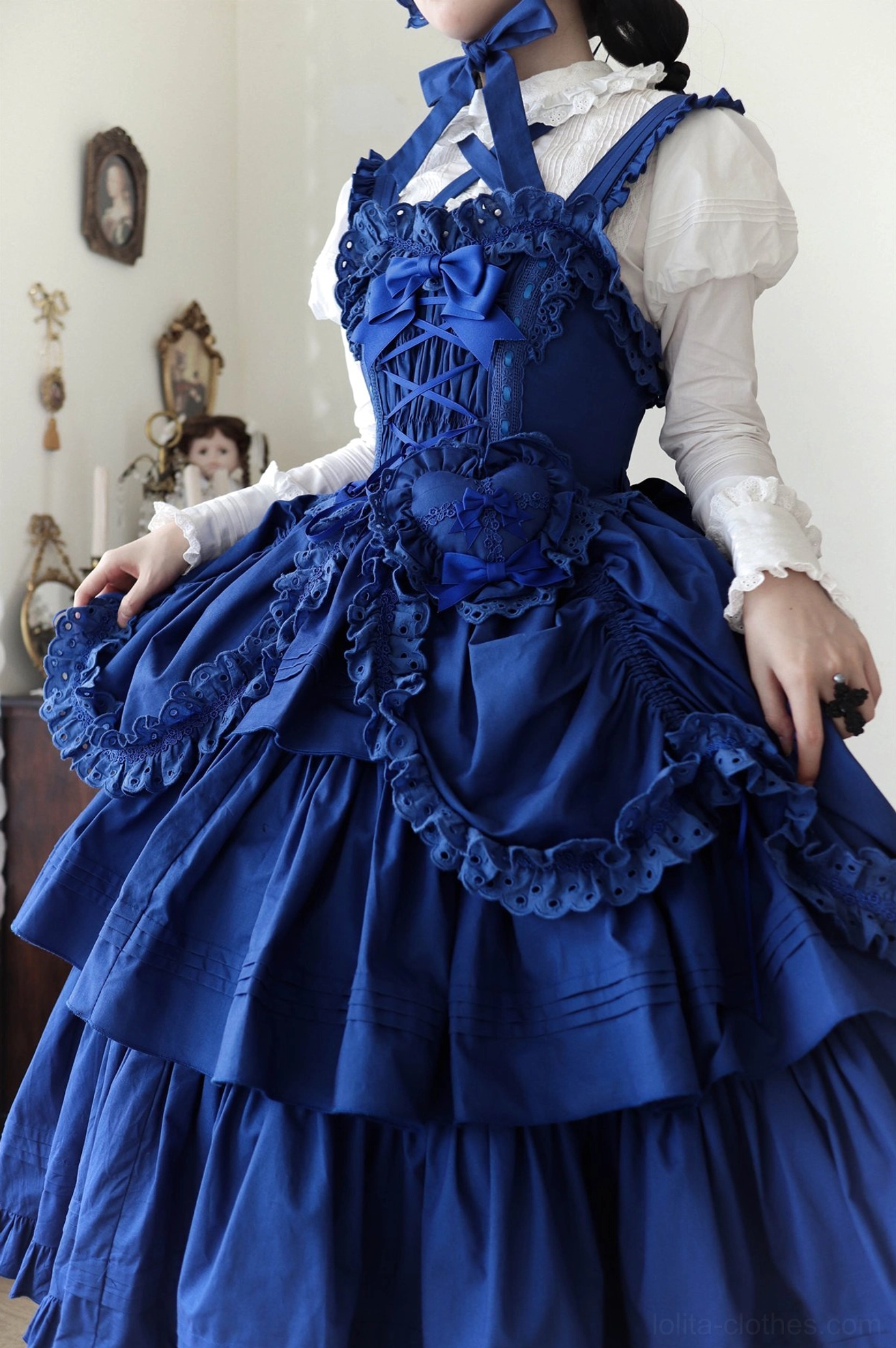 Close-up detail of klein blue Lolita JSK fabric showing jewel-tone color richness and satin sheen quality