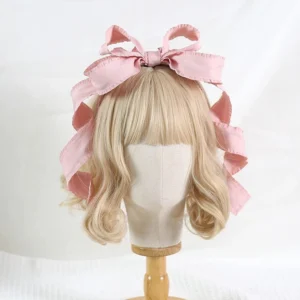 Korean pink 3D oversized bowknot Lolita hair clip KC with wavy satin ribbon edges on mannequin front view sweet Lolita style