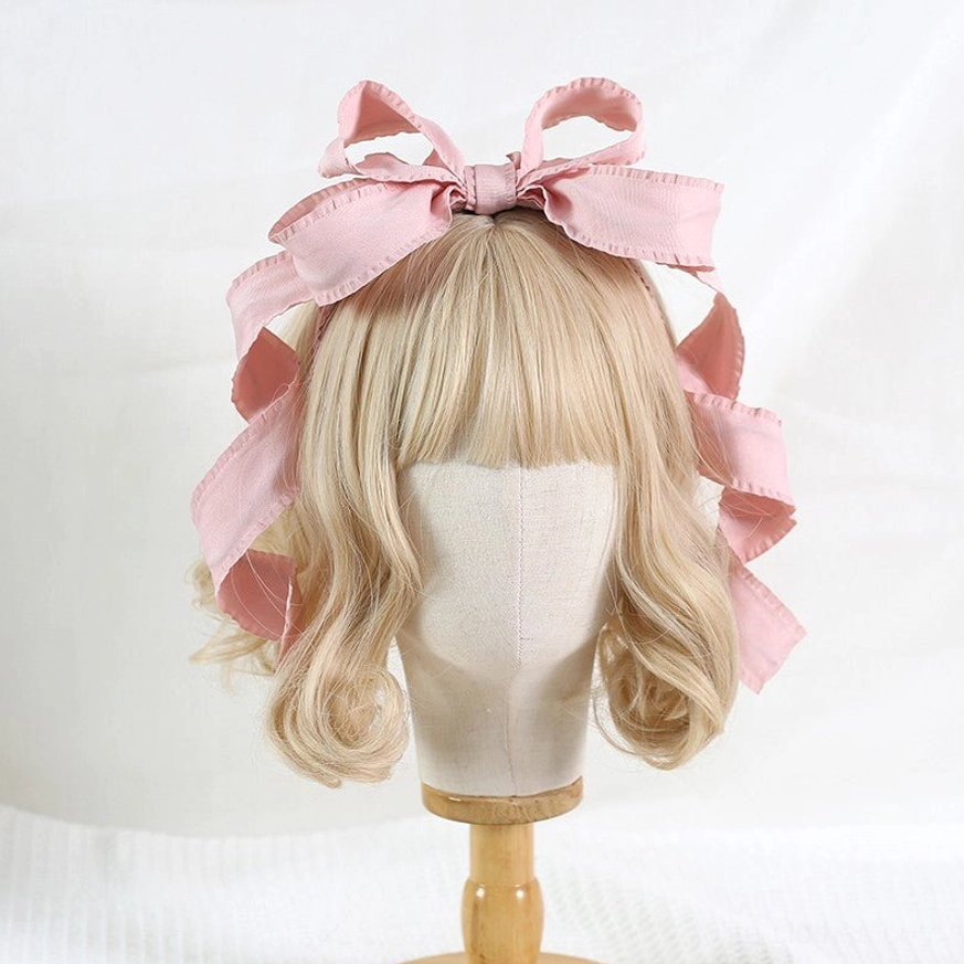 Korean pink 3D oversized bowknot Lolita hair clip KC with wavy satin ribbon edges on mannequin front view sweet Lolita style