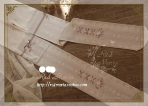Lace bow 80D lolita pantyhose product display with packaging and embroidery details flat lay