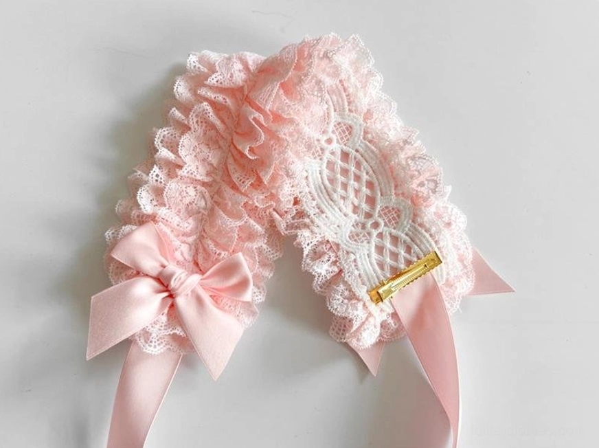 Detailed close-up of customizable lace KC headdress showing handmade ruffled lace texture, precision stitching, and satin bow construction quality