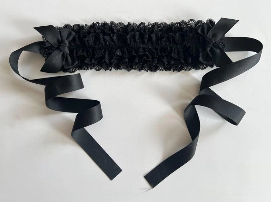 Lace KC headdress wearing guide illustration showing proper positioning on head, clip placement, and ribbon fastening for secure comfortable wear