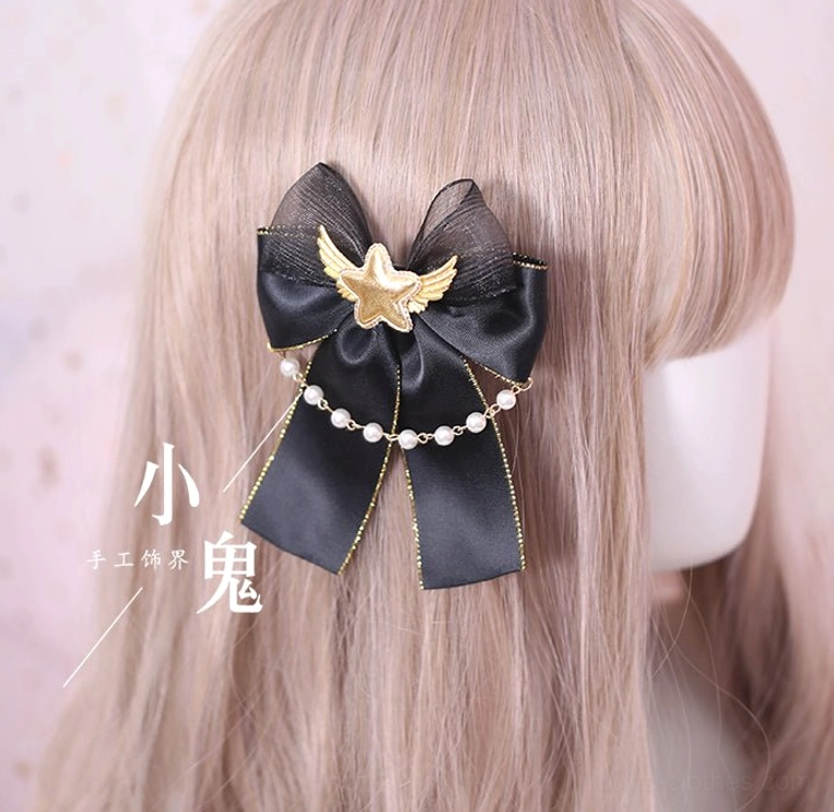 large gothic lolita bow hairclip back close-up black mesh satin bow golden star wing brooch pearl chain