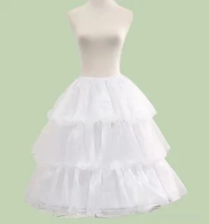 Large lolita petticoat three-tiered white ruffled tulle bustle with elastic waist and steel support rings front view on dress form