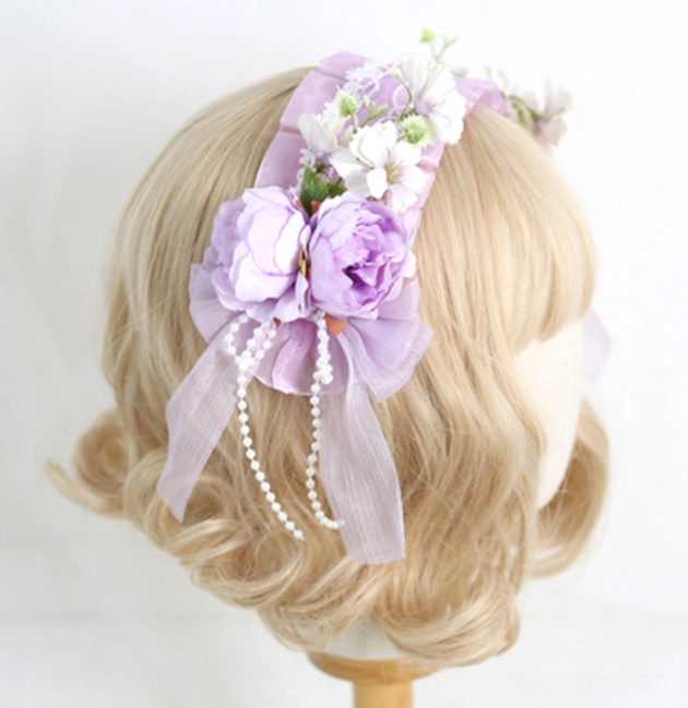 Lavender lolita floral headband with artificial peonies and purple sheer bow showing back view on mannequin with pearl decorations