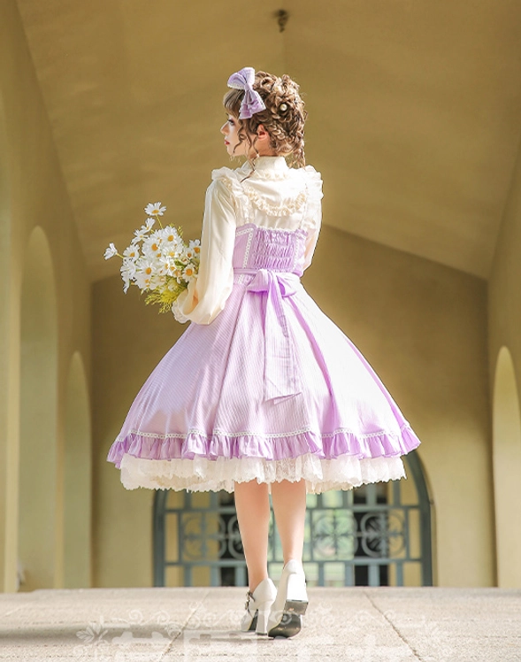 Lavender classic lolita OP dress back view full-body ribbon bow ruffled lace hem connected white blouse sleeves vintage corridor