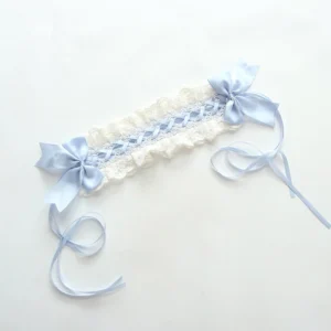 Light blue double-lace sweet Lolita headband featuring satin bows and cross-weave ribbon details, flat lay product shot
