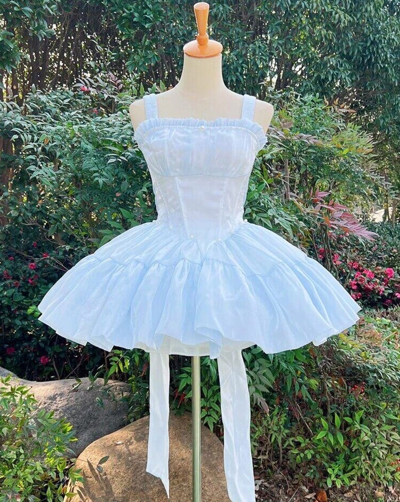 Light blue lolita dress with built-in petticoat front full view spaghetti straps corset bodice voluminous bubble skirt