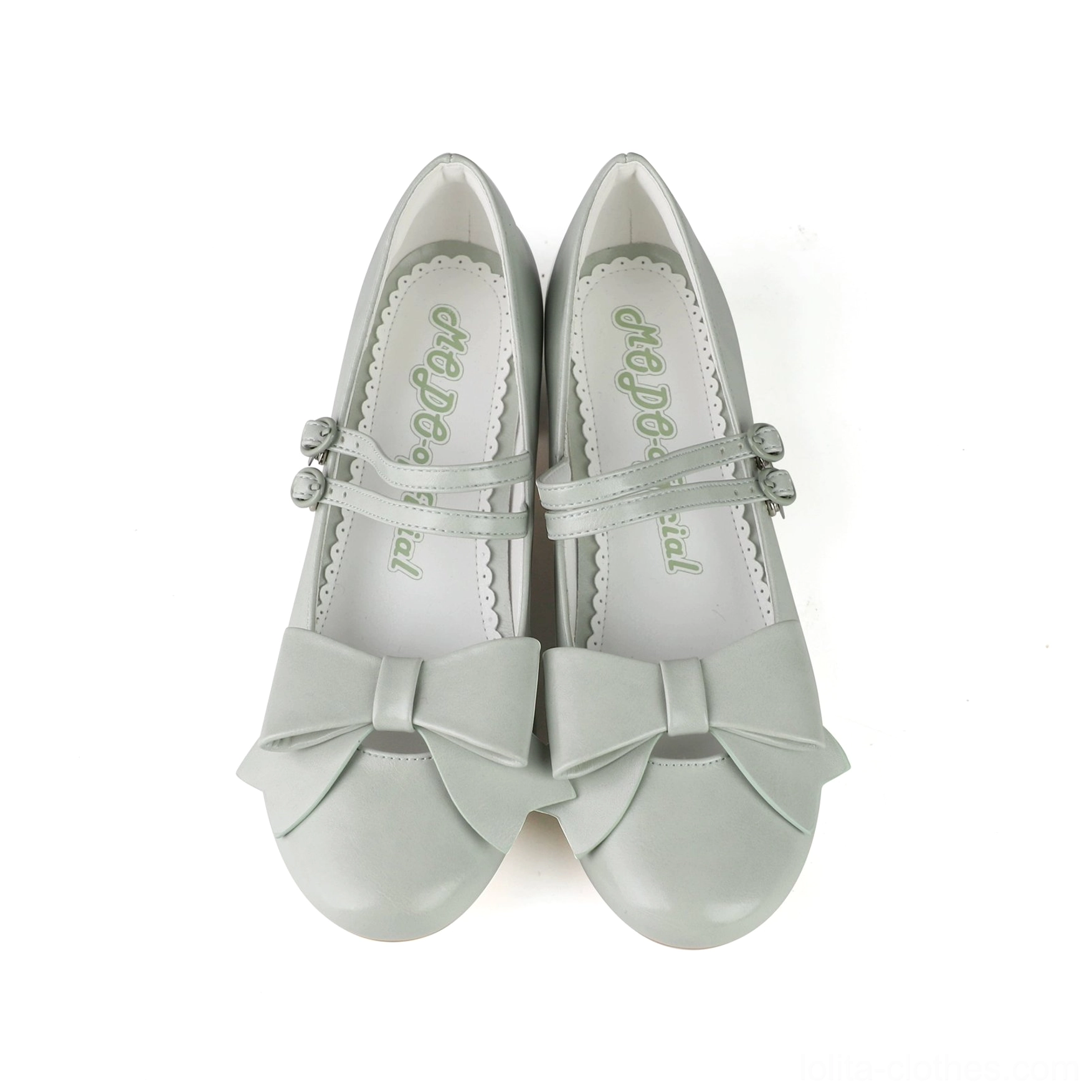 Light blue Lolita Mary Jane shoes elegant pointed toe design low block heel ankle strap bow displayed sophisticated sweet Lolita footwear