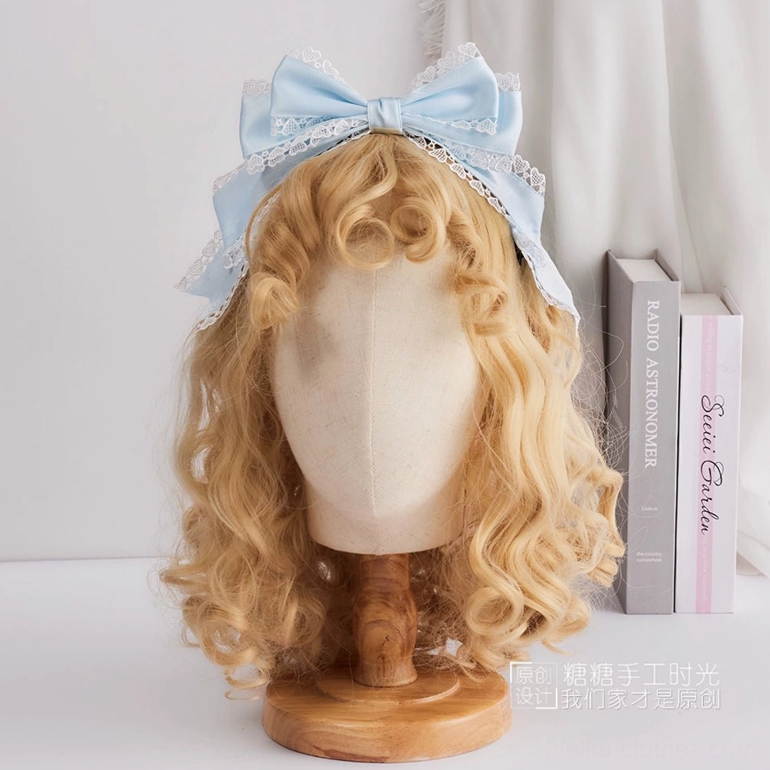 Light blue satin sweet lolita oversized bow headdress plain design without lace trim front flat view KC attachment