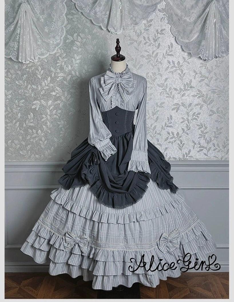 Light blue striped lolita blouse front placket detail showing ruffles and button closure