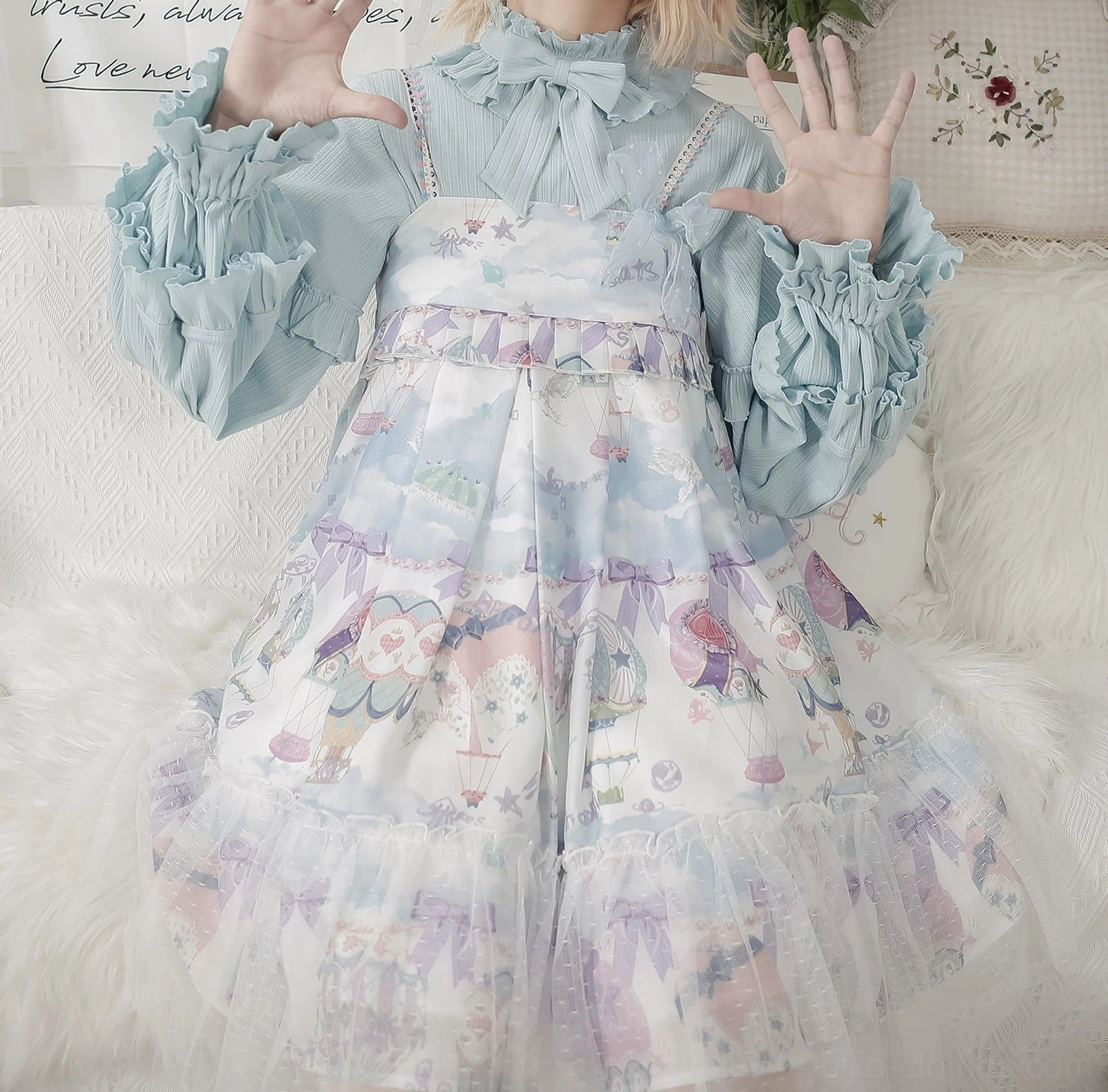 Light blue sweet lolita knit inner top with ruffled flared sleeves and bow neckline matching pastel fairy tale JSK dress