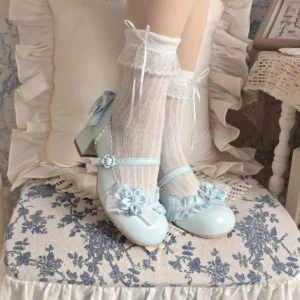 light blue sweet lolita mary jane heel shoes on model feet lower leg ruffled lace socks floral applique ankle strap bow
