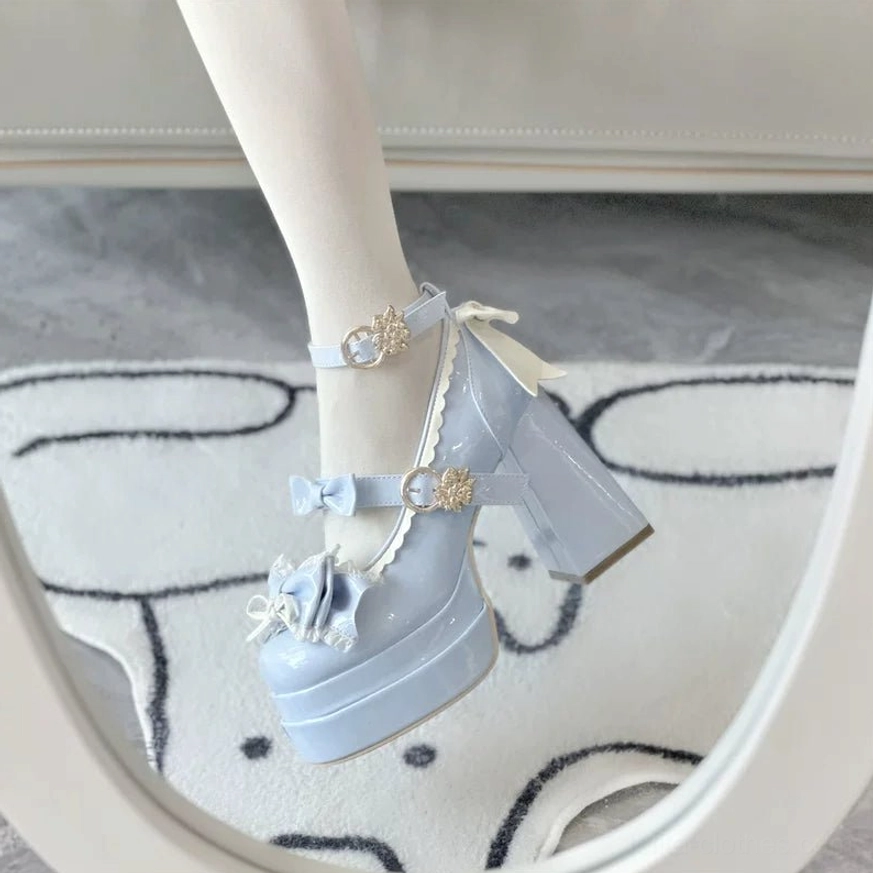 Light blue sweet Lolita platform heels on-foot wearing with white stockings bow and buckle details