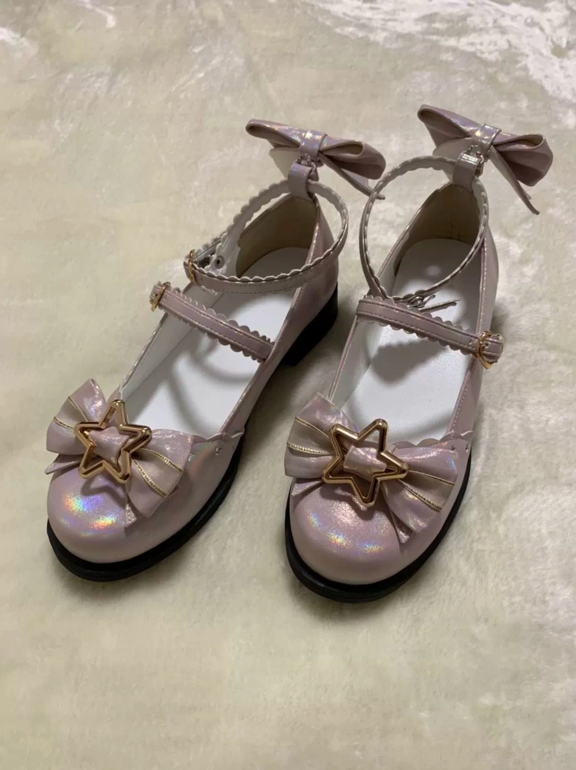 Light pink glitter sweet lolita mary jane shoes with heart-shaped buckles dual ankle straps rounded toe design and decorative star hardware for complete lolita coordinate