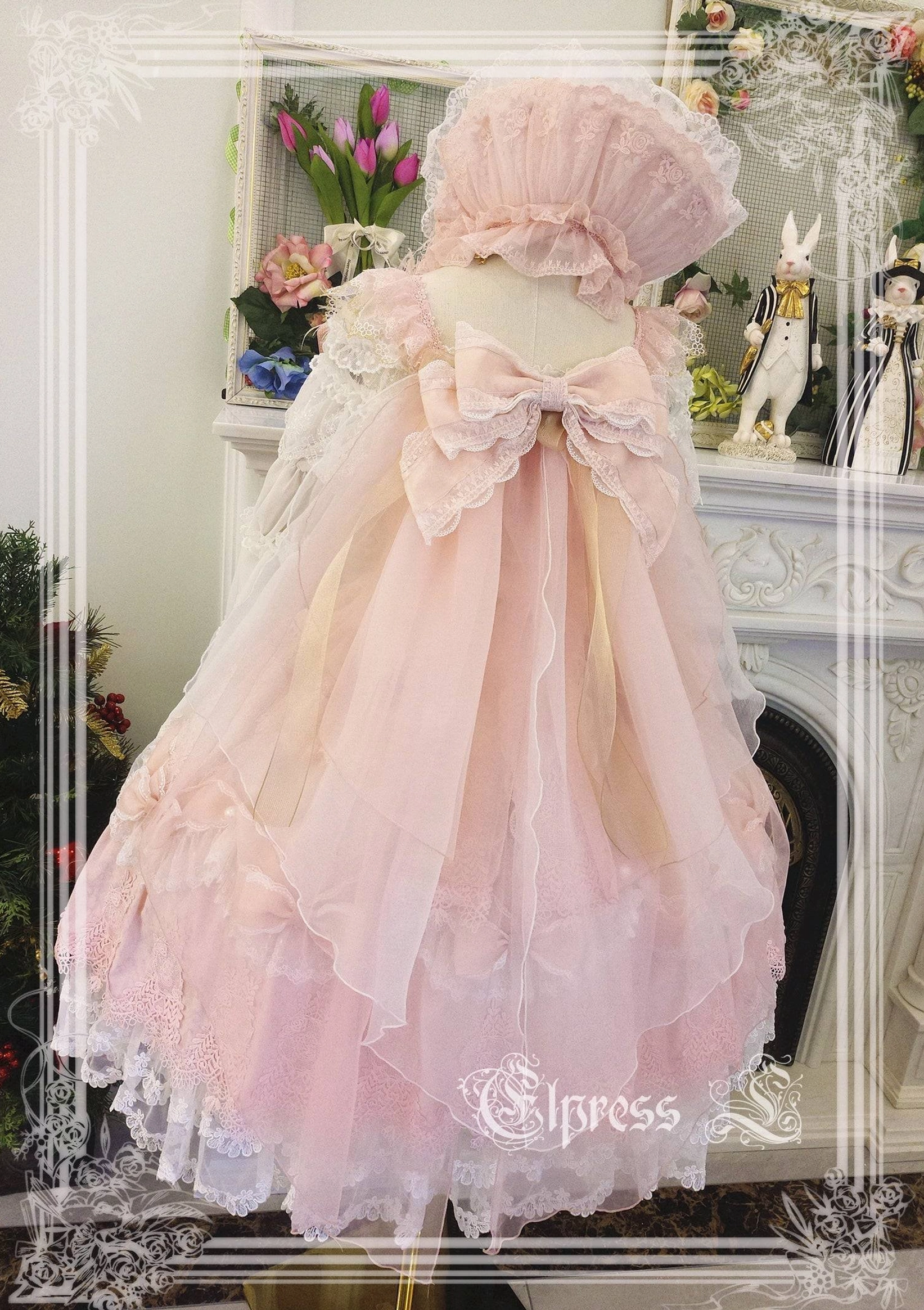 Light pink lolita JSK jumper skirt dress back view with gradient rose organza skirt and oversized satin bow decoration Victorian style
