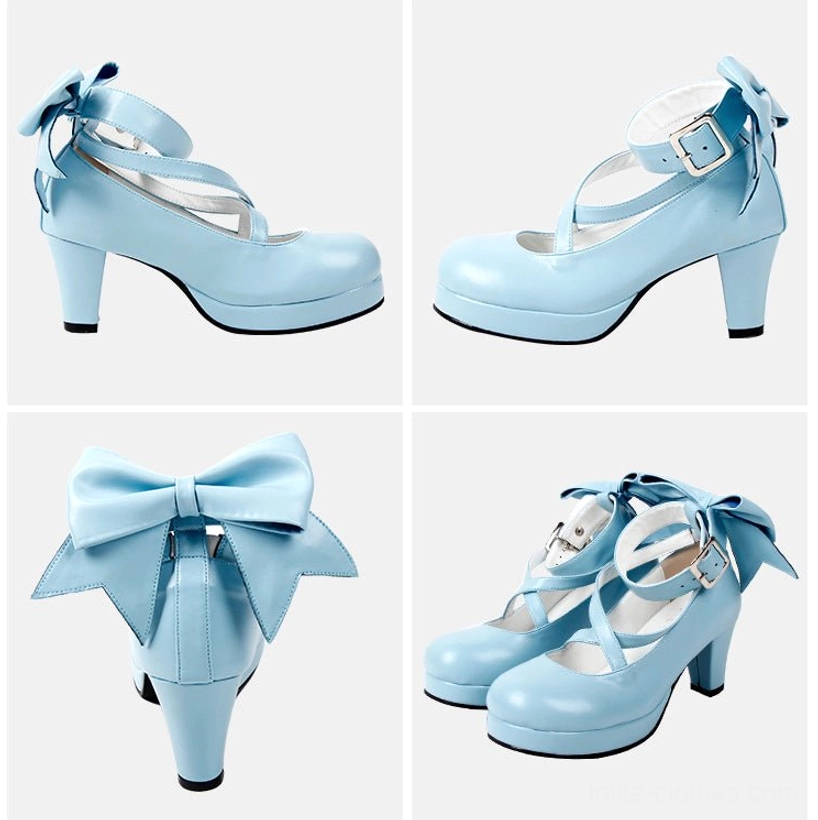 Light pink pastel Lolita platform high heel shoes with soft matte finish, crossover ankle buckle straps, large decorative back bow, round platform toe, and block heel - sweet style option