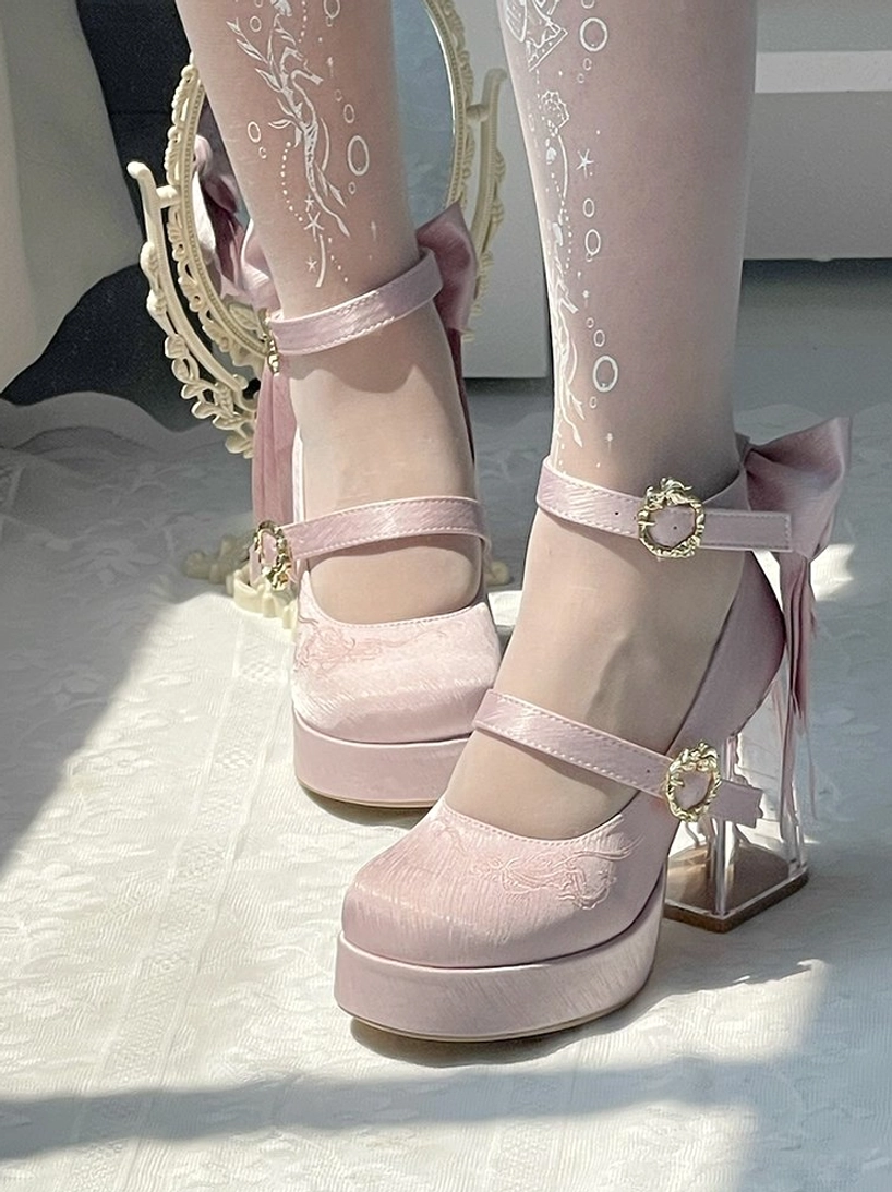Light pink satin classic lolita platform heels side view with gold heart buckles ankle bow and sheer stockings