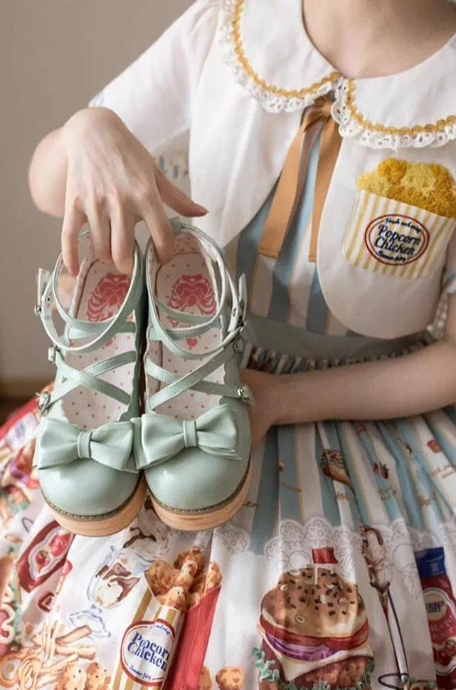 Light pink sweet lolita platform shoes product display side view smooth patent leather finish thick wooden platform round closed toe bow strap design elevation