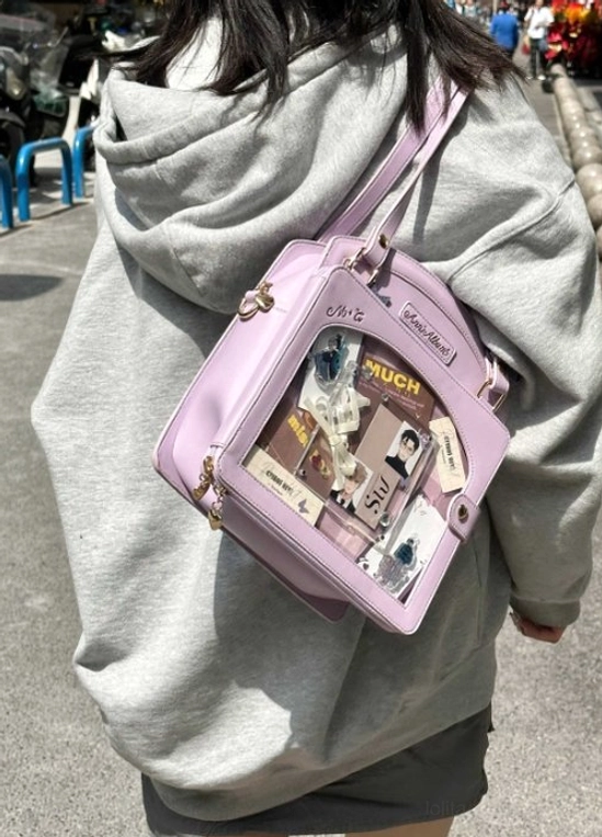 Light purple lolita checkered itabag front flat lay garden view with blue bow display window top carry handles branded patch