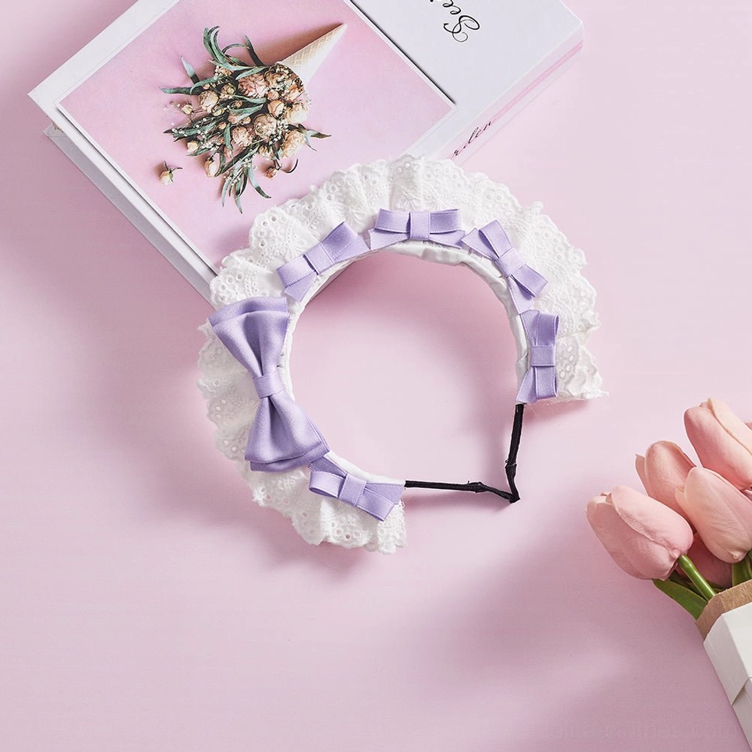 Light purple lolita lace KC headband overhead display showing whimsical lavender satin bows with white ruffled lace decoration for fairy kei coordinates
