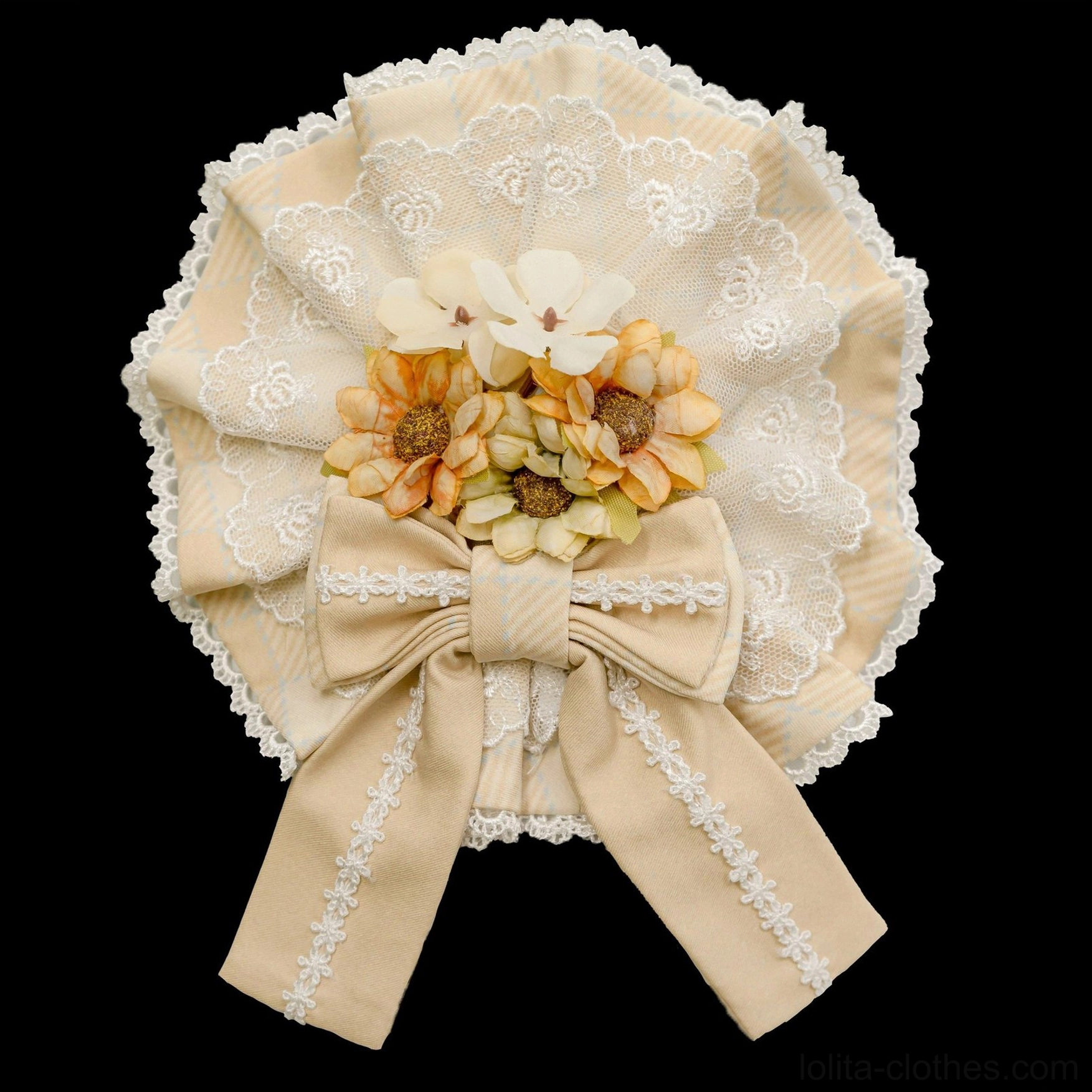 Light yellow round flower lolita brooch flat lay featuring artificial sunflower arrangement satin ribbon bow and delicate lace overlay
