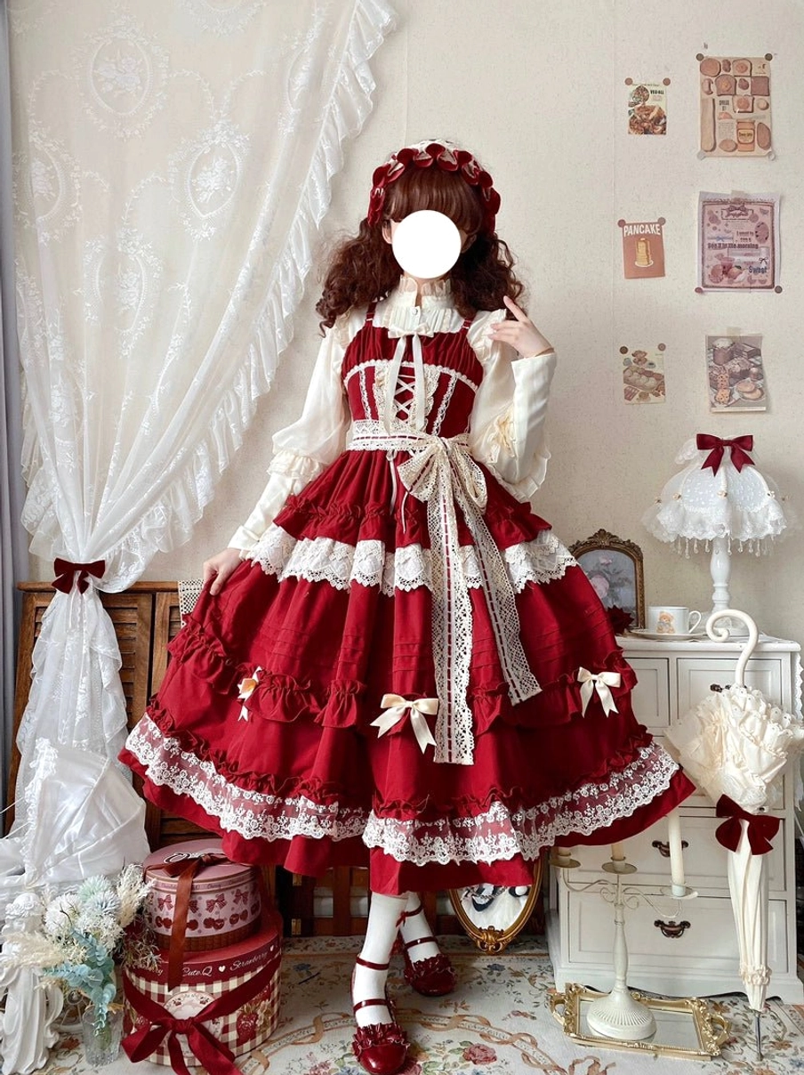 Lilianne red lolita jsk dress front three quarter view vintage red white colorway lace trims satin bows waist sash