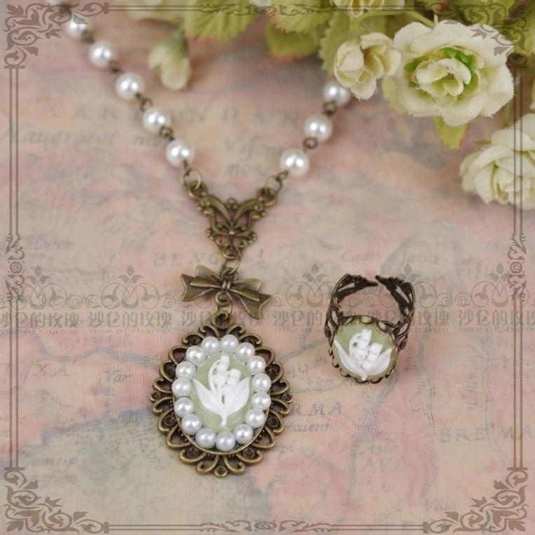 Lily of the valley pearl necklace extension chain detail showing adjustable sizing mechanism gold clasp delicate chain links for customizable fit Lolita jewelry