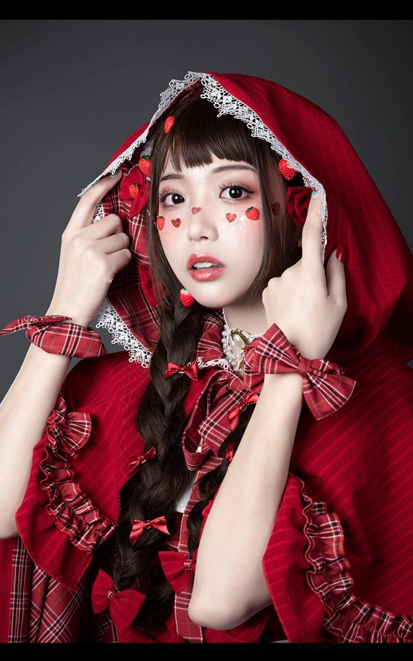 Little Red Riding Hood Lolita cape dress ensemble detailed view showing embroidered apron heart motif white lace ruffles red plaid pattern layers