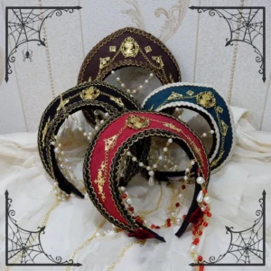 Assorted retro Lolita beaded headdresses in multiple color variants flat lay display on white fabric backdrop, showing gold ornamental emblems and hanging bead tassel decorations, top-down overhead view