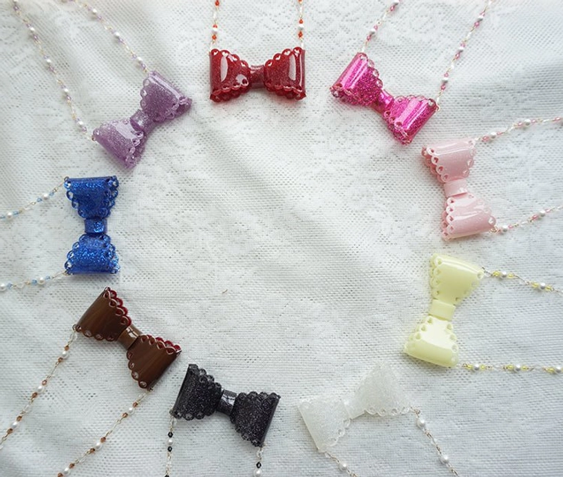 Handmade sweet lolita beaded bow necklace with adjustable extension chain and lobster clasp detail shot