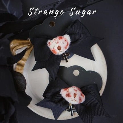 Bloody bear bow lolita hair clips set black grosgrain bow with plush bear charm and cross pendant on ceramic tray